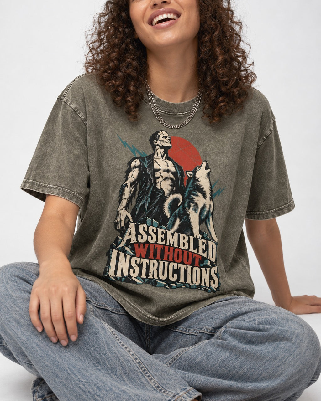 Husky Assembled Without Instructions Frankenstein Graphic Washed Tee in Army Green, worn by a seated model