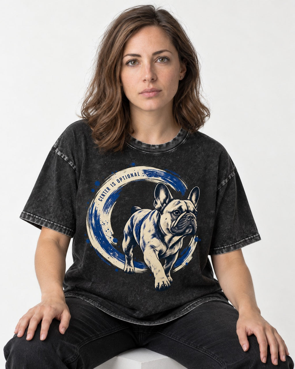 Frenchie Center Is Optional Brush Circle Graphic Washed Tee in Black, worn by a seated model
