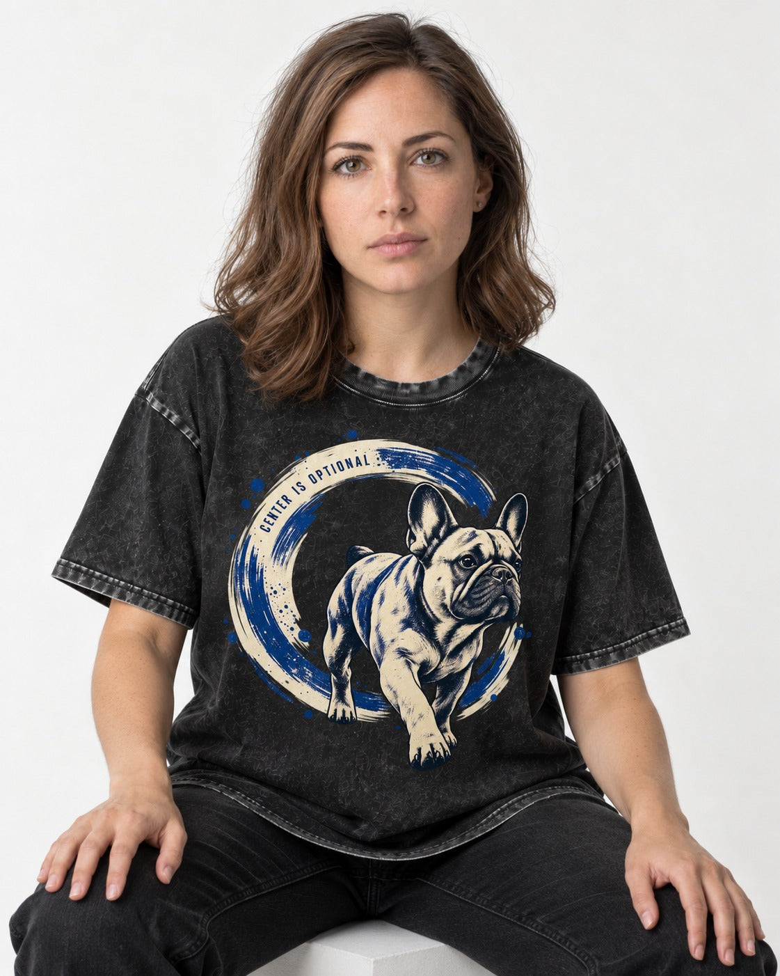 Frenchie Center Is Optional Brush Circle Graphic Washed Tee in Black, worn by a seated model