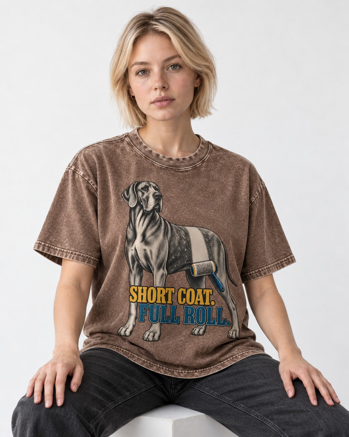 Short Coat Full Roll Great Dane Washed Tee in Coffee, worn by a seated model