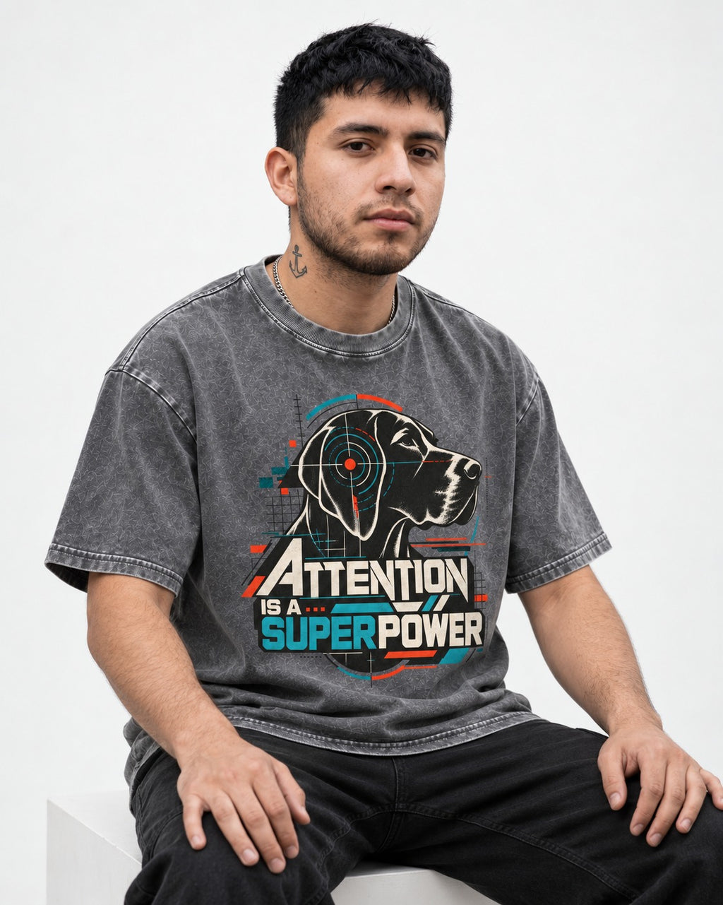 German Shorthaired Pointer Attention Is a Superpower Washed Tee in Gray, worn by a seated model