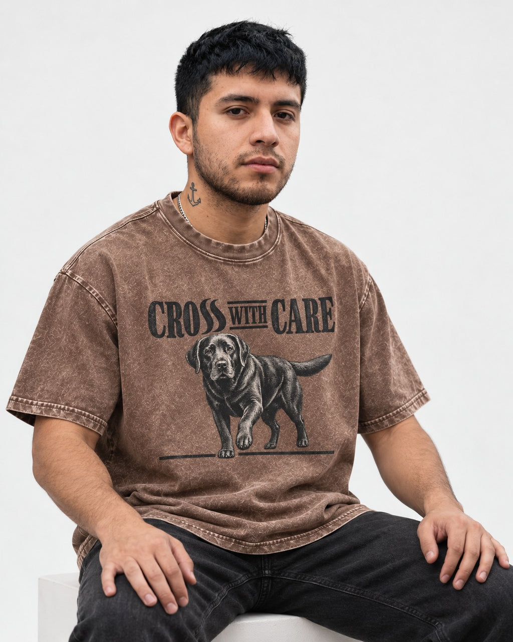 Labrador Retriever Cross with Care Washed Tee in Coffee, worn by a seated model
