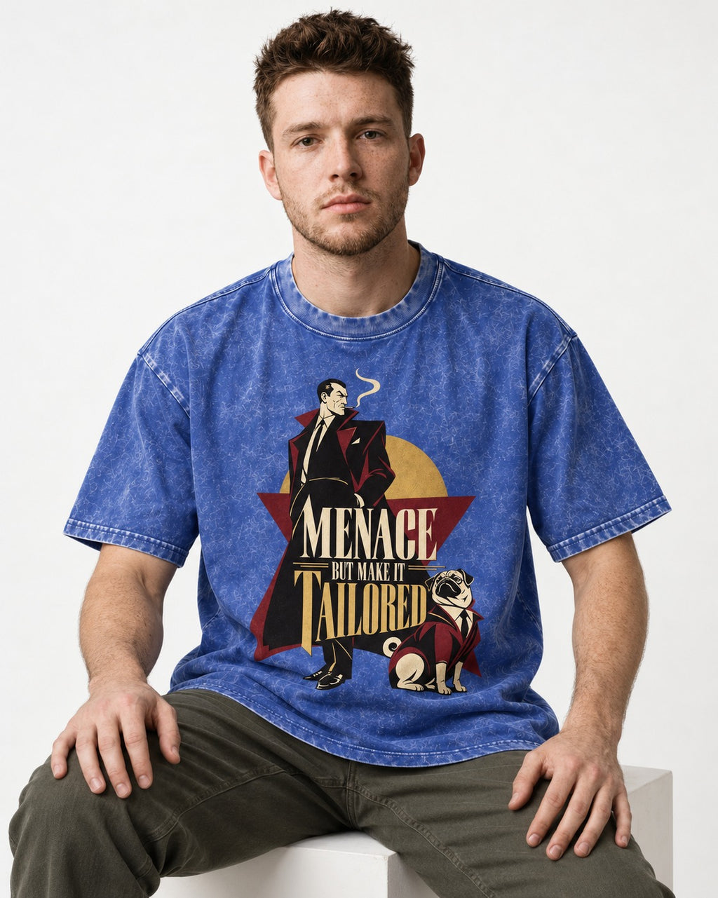 Pug Menace But Make It Tailored Graphic Washed Tee in Royal Blue, worn by a seated model