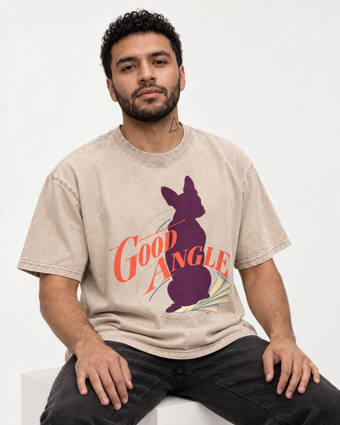 Good Angle Boston Terrier Paper Graphic Washed Tee in Apricot, worn by a seated model