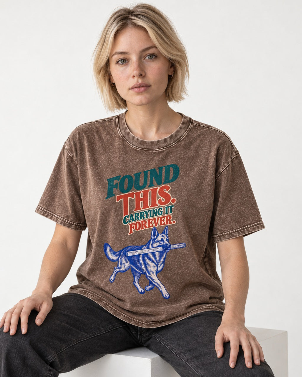 German Shepherd Dog Carrying It Forever Washed Tee in Coffee, worn by a seated model
