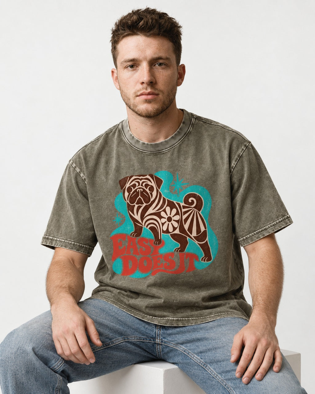 Pug Easy Does It Retro Floral Graphic Washed Tee in Army Green, worn by a seated model