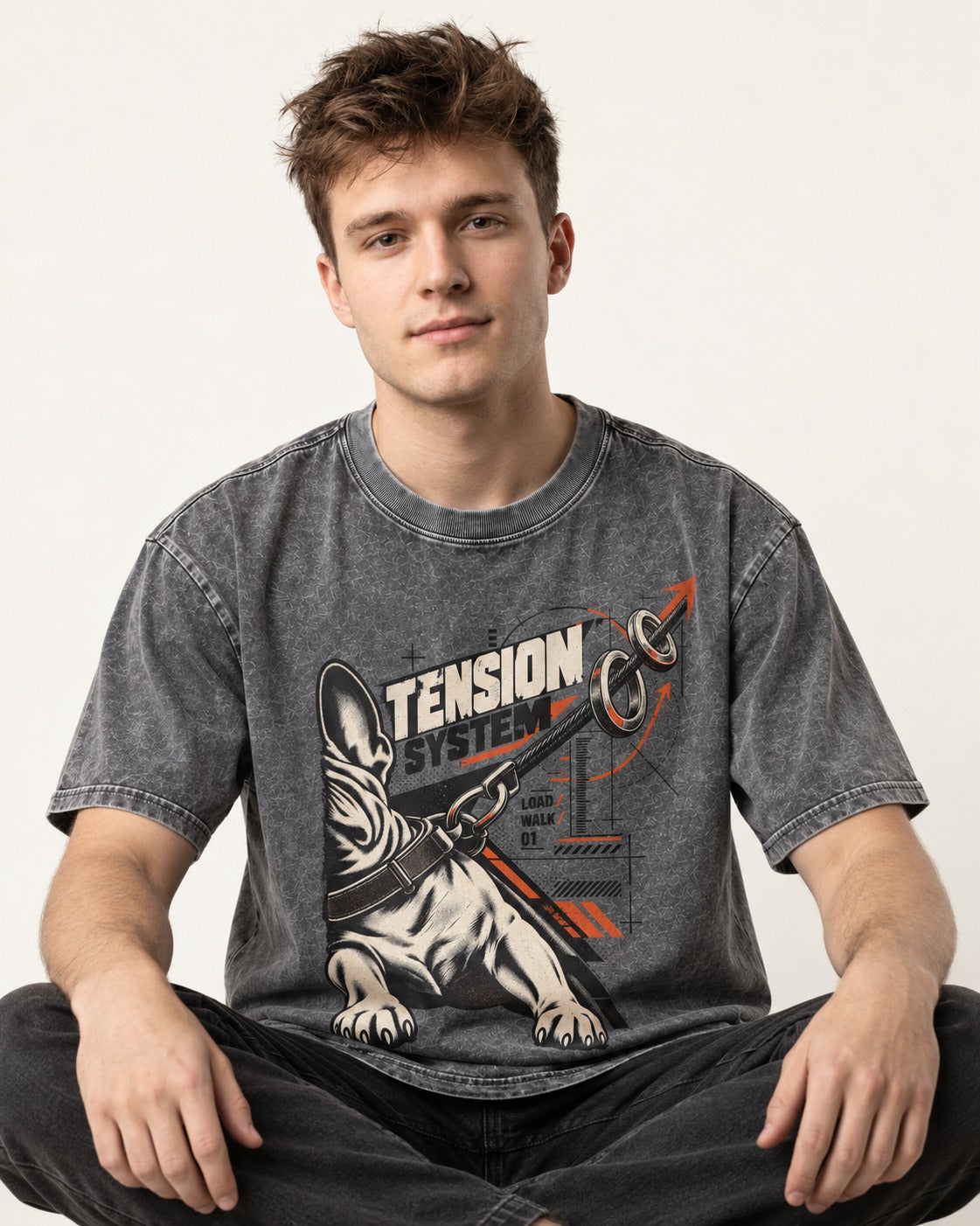 Frenchie Tension System Washed Tee in Gray, worn by a seated model