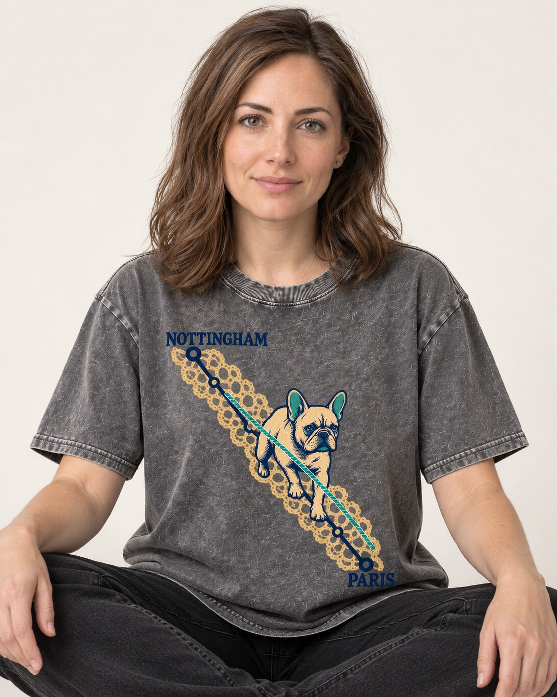 Nottingham to Paris Frenchie Washed Tee in Gray, worn by a seated model