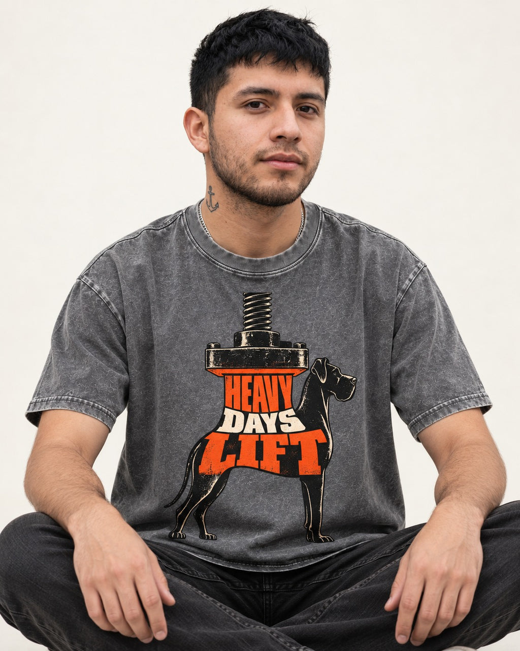 Great Dane Heavy Days Lift Washed Tee in Gray, worn by a seated model