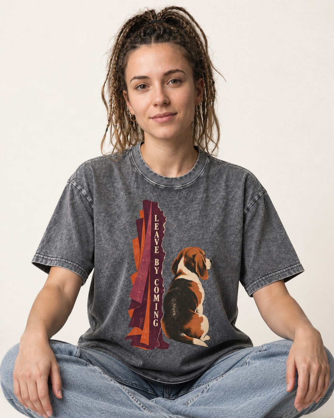 Leave By Coming Beagle Companion Washed Tee in Gray, worn by a seated model
