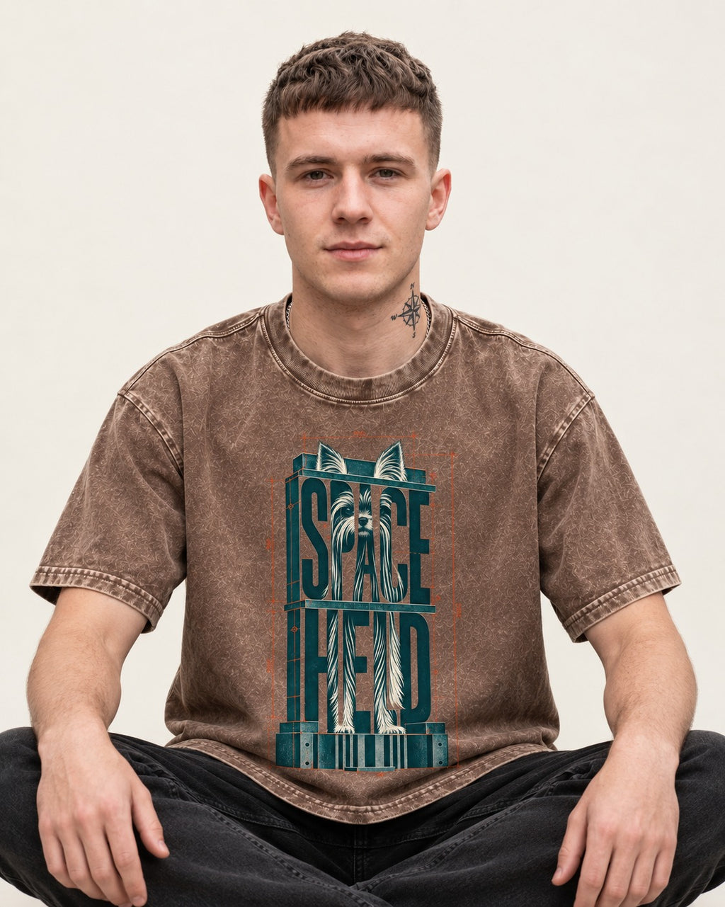 Yorkshire Terrier Space Head Washed Tee in Coffee, worn by a seated model