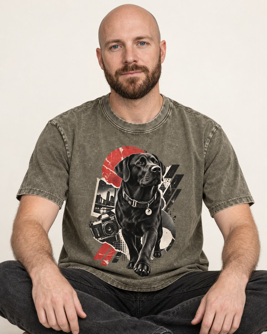 Labrador Retriever Camera City Halftone Collage Graphic Washed Tee in Army Green, worn by a seated model