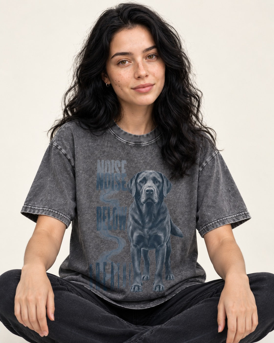 Labrador Retriever Breathe Below the Noise Washed Tee in Gray, worn by a seated model