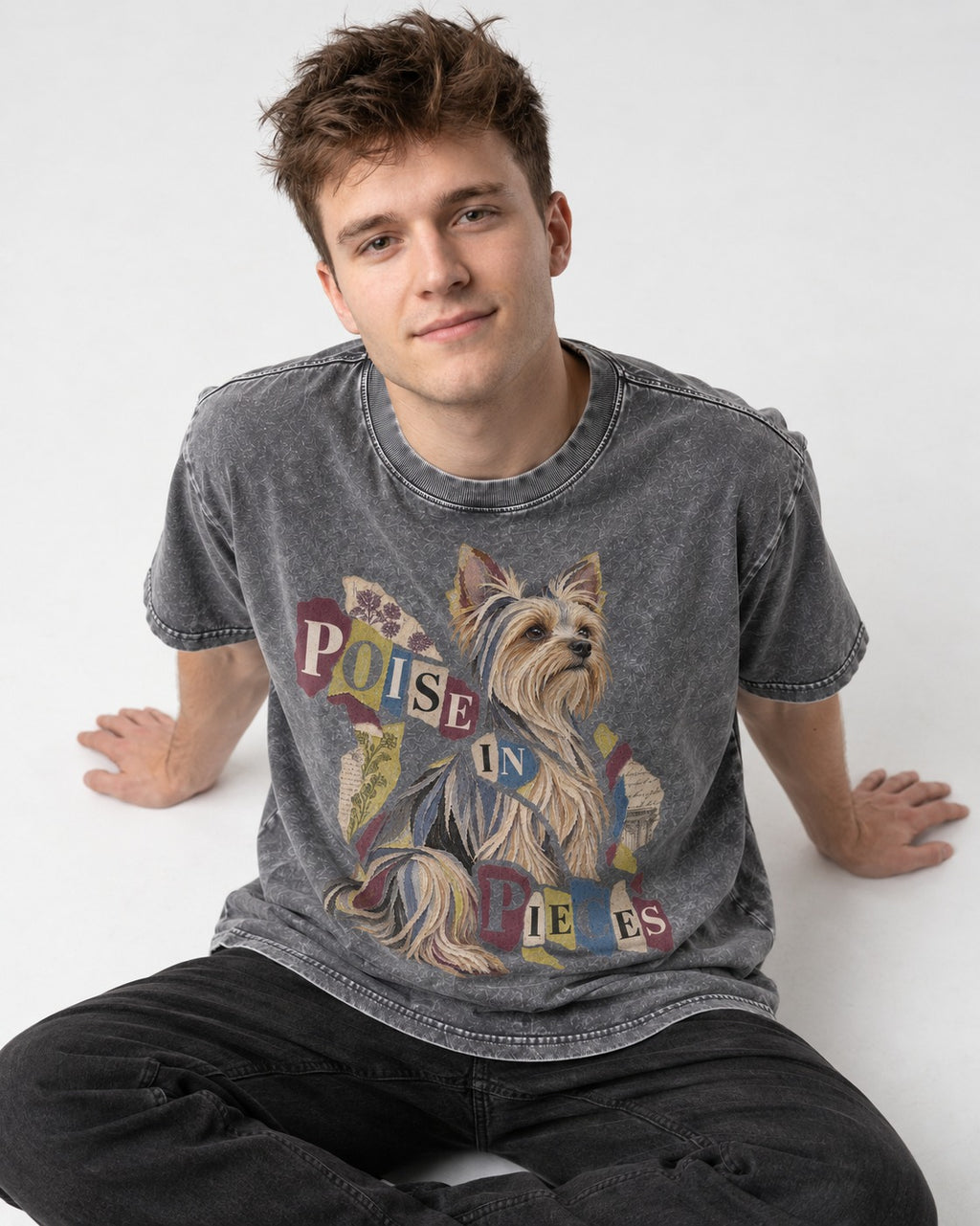 Yorkshire Terrier Poise in Pieces Torn Paper Collage Graphic Washed Tee in Gray, worn by a seated model