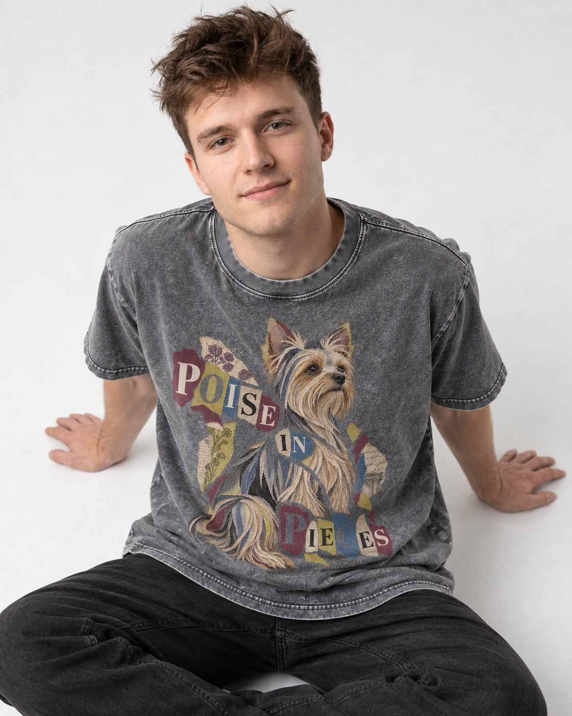 Yorkshire Terrier Poise in Pieces Torn Paper Collage Graphic Washed Tee in Gray, worn by a seated model