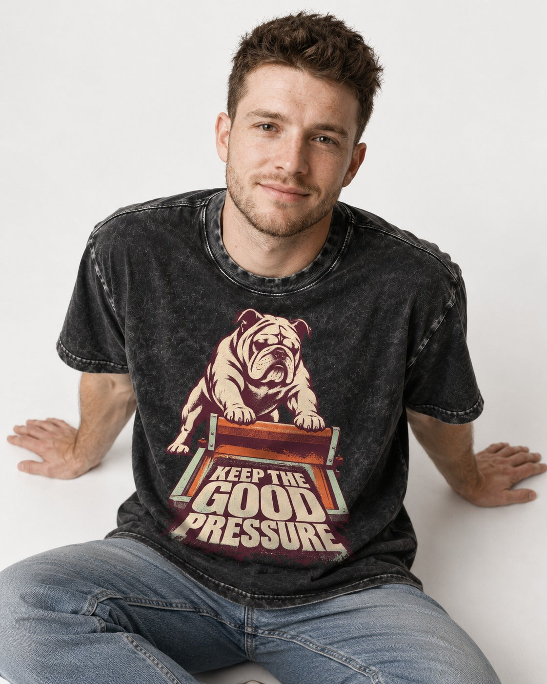 English Bulldog Keep the Good Pressure Printing Press Graphic Washed Tee in Black, worn by a seated model