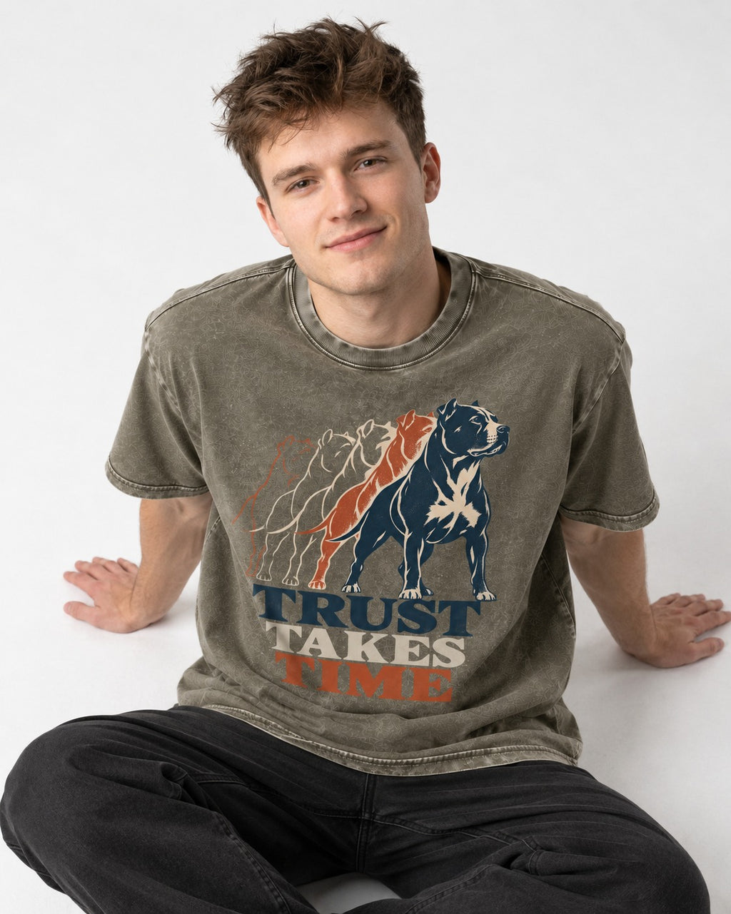 Pitbull Trust Takes Time Progression Graphic Washed Tee in Army Green, worn by a seated model