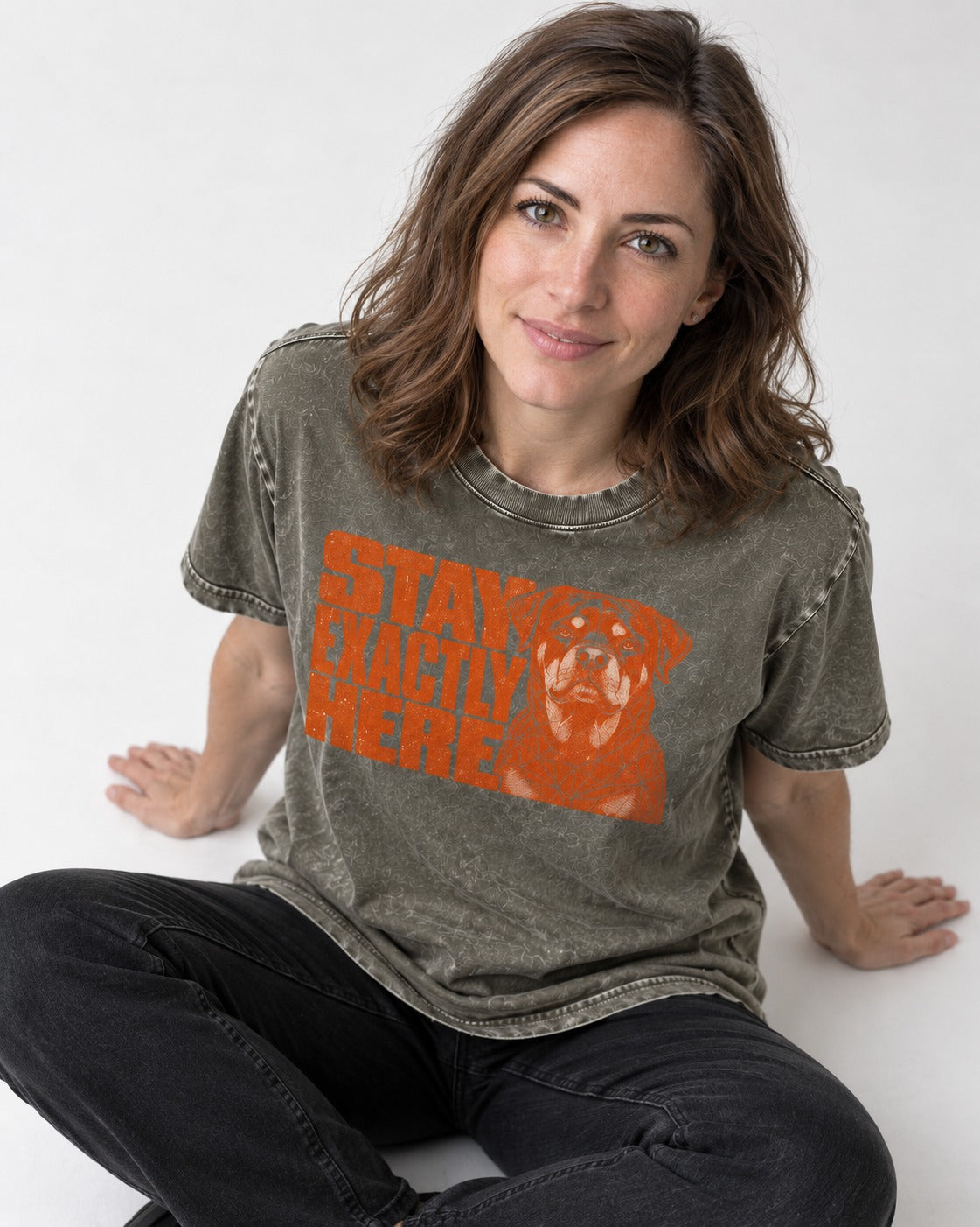Rottweiler Stay Exactly Here Block Portrait Graphic Washed Tee in Army Green, worn by a seated model
