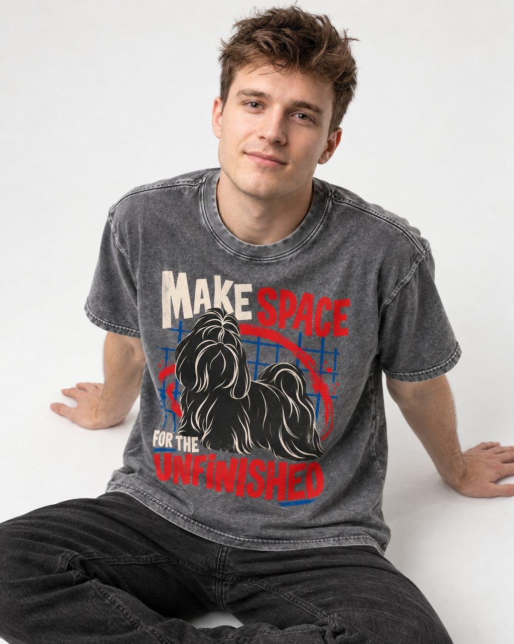Shih Tzu Make Space for the Unfinished Abstract Circle Graphic Washed Tee in Gray, worn by a seated model