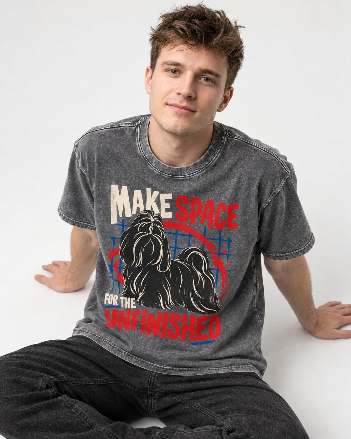 Shih Tzu Make Space for the Unfinished Abstract Circle Graphic Washed Tee in Gray, worn by a seated model