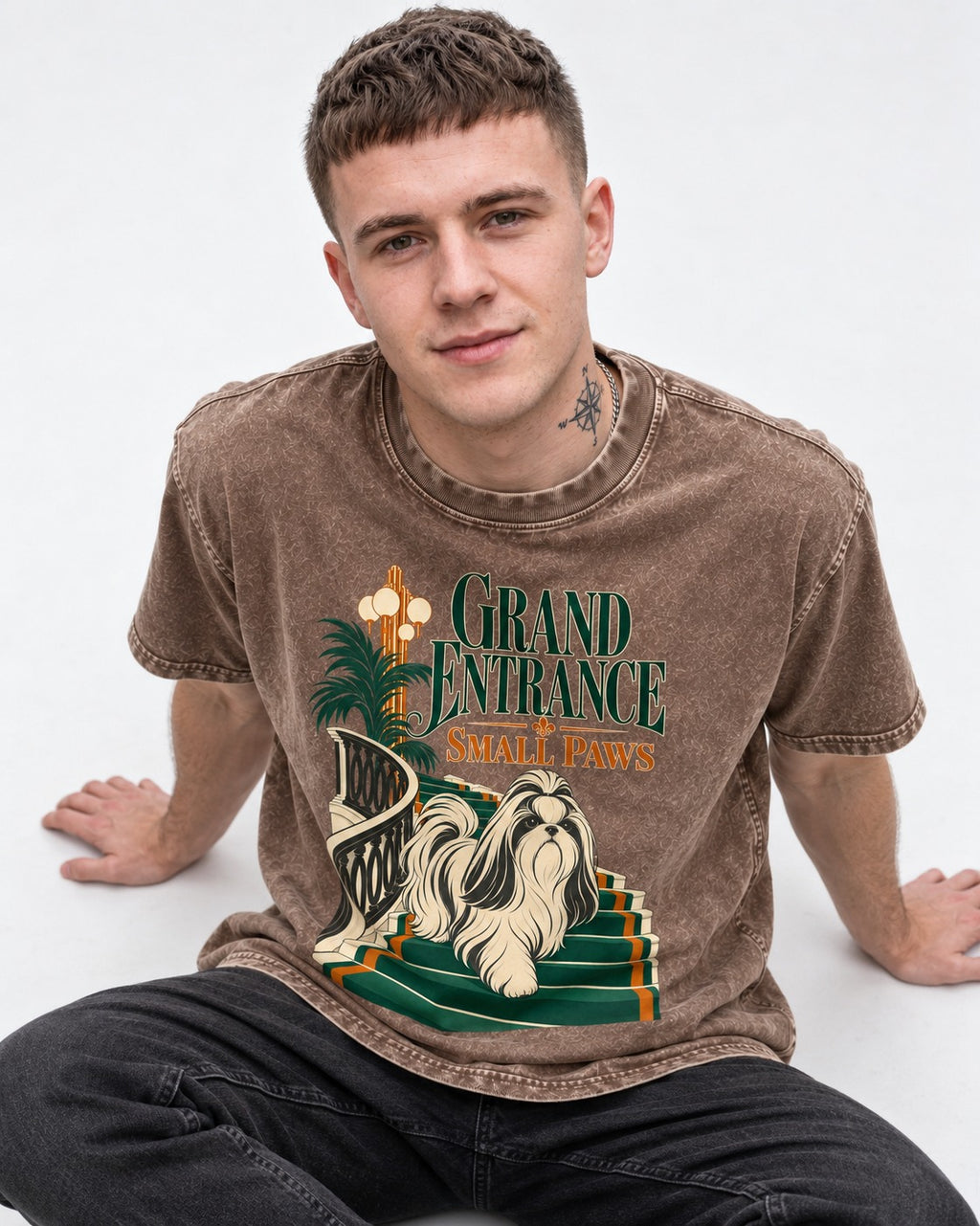Shih Tzu Grand Entrance Small Paws Staircase Graphic Washed Tee in Coffee, worn by a seated model