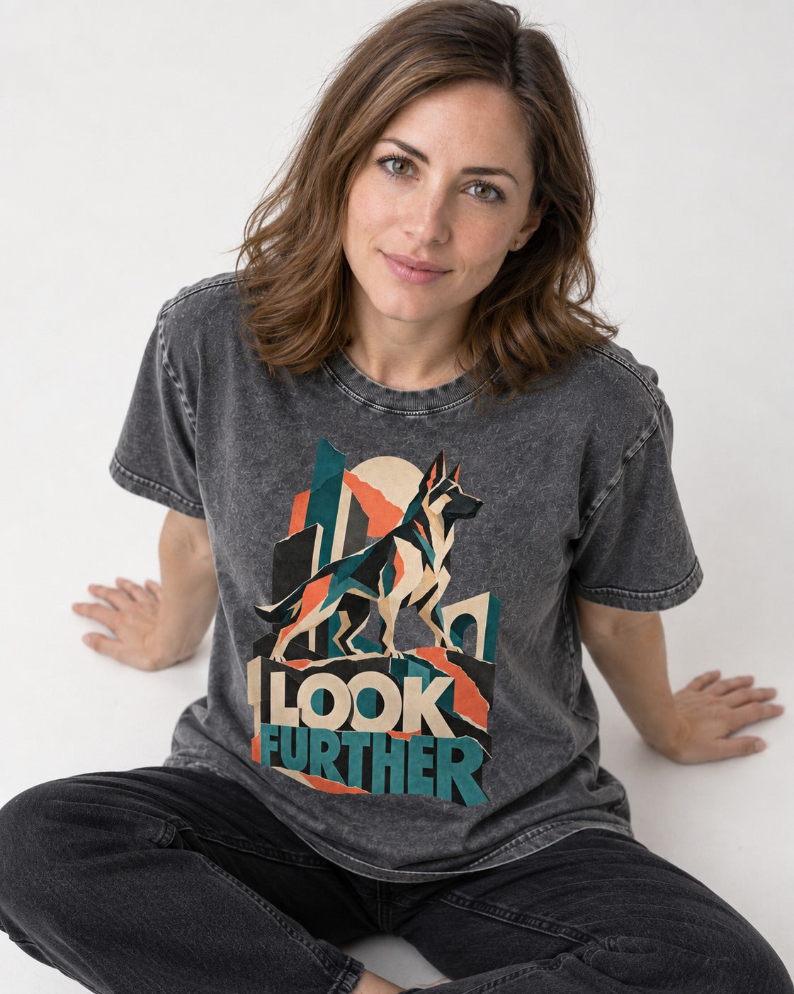 Look Further German Shepherd Dog Washed Tee in Gray, worn by a seated model