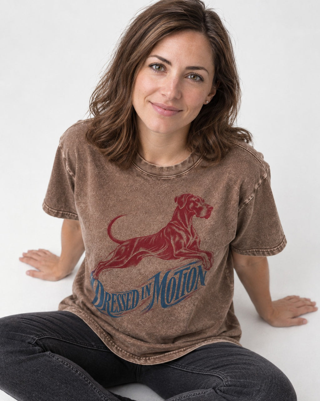 Great Dane Dressed in Motion Washed Tee in Coffee, worn by a seated model