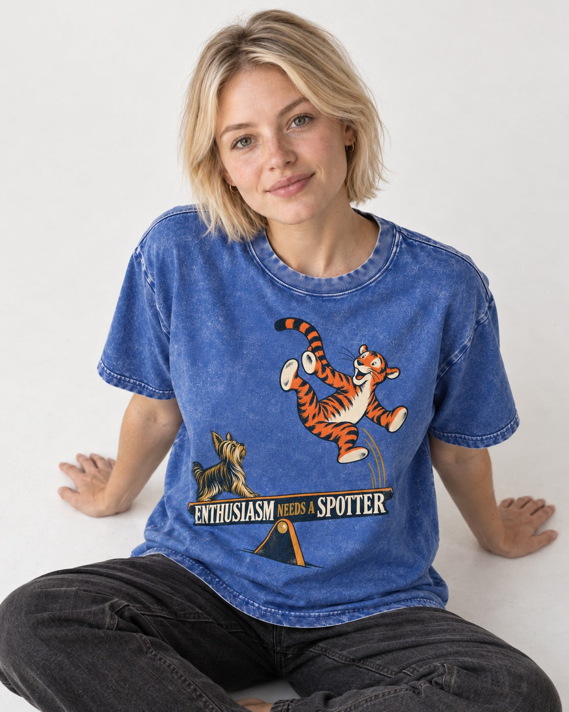 Yorkshire Terrier Enthusiasm Needs a Spotter Seesaw Graphic Washed Tee in Royal Blue, worn by a seated model