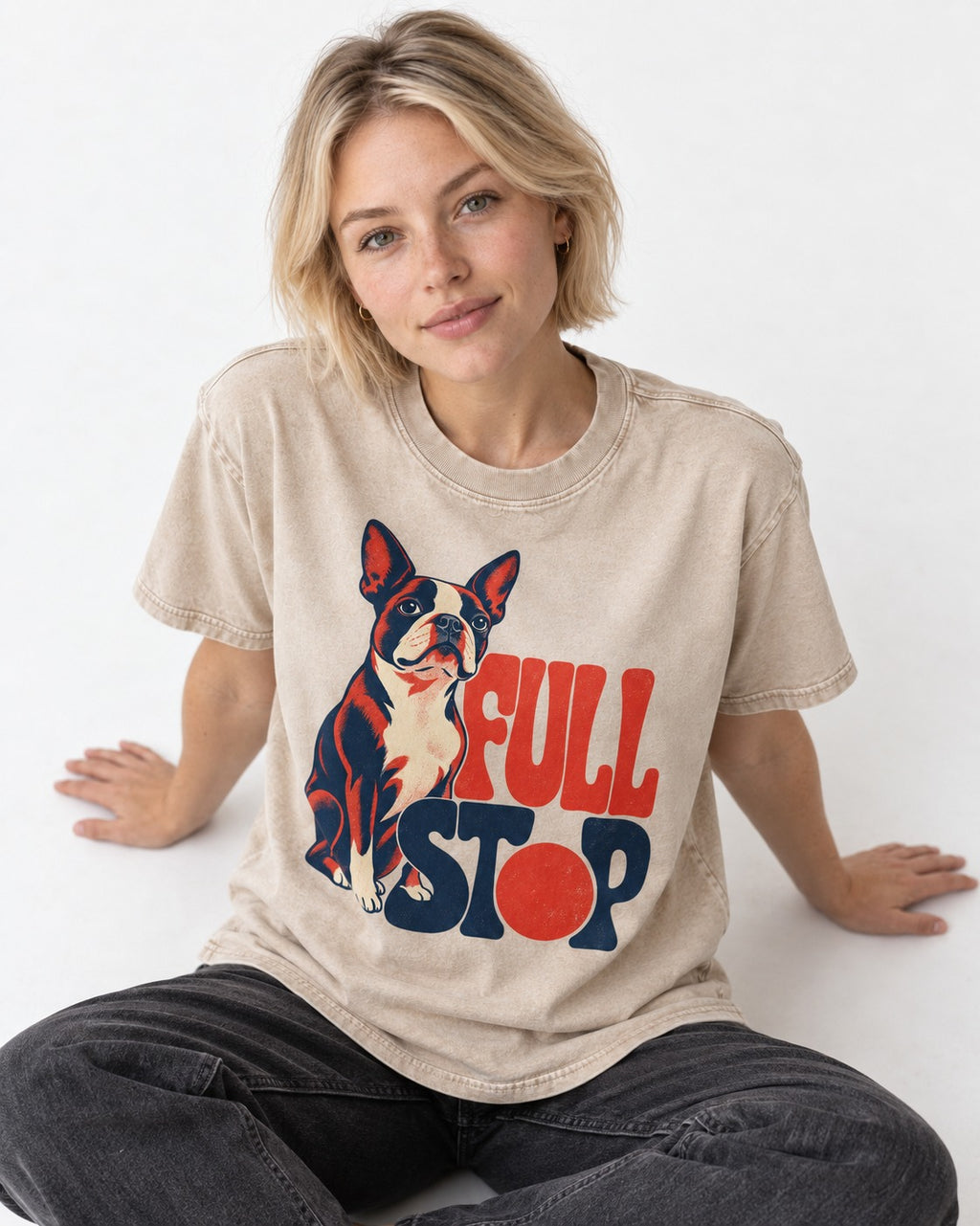 Full Stop for Boston Terrier Washed Tee in Apricot, worn by a seated model