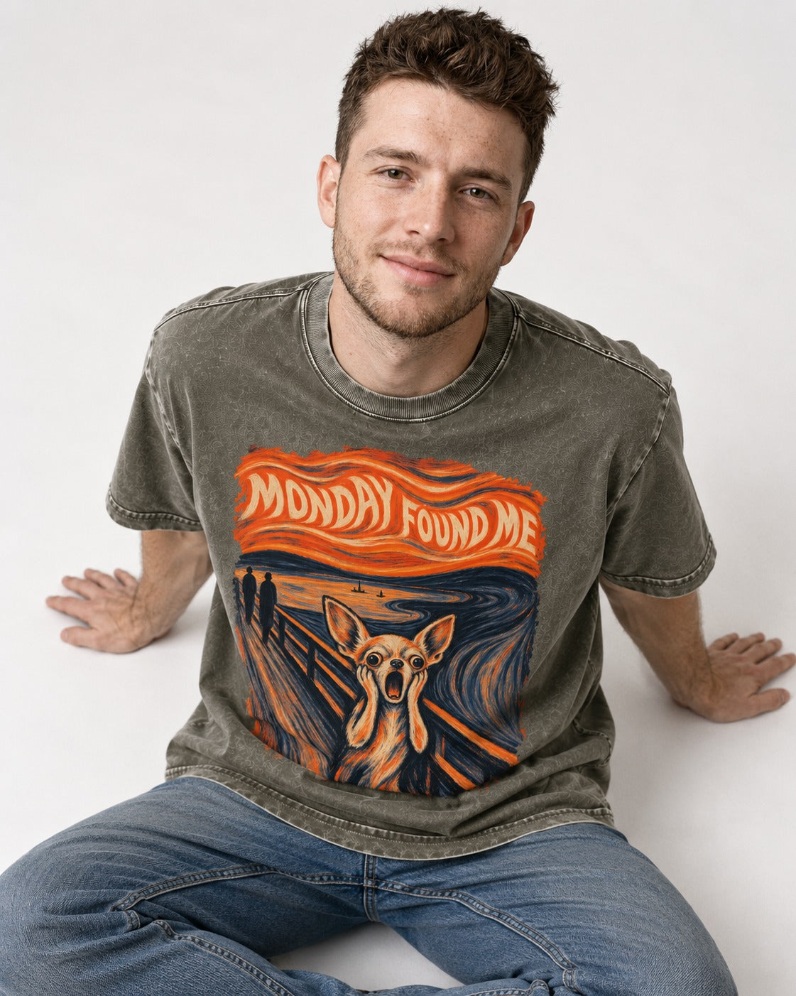 Monday Found Me Chihuahua Scream Banner Washed Tee in Army Green, worn by a seated model