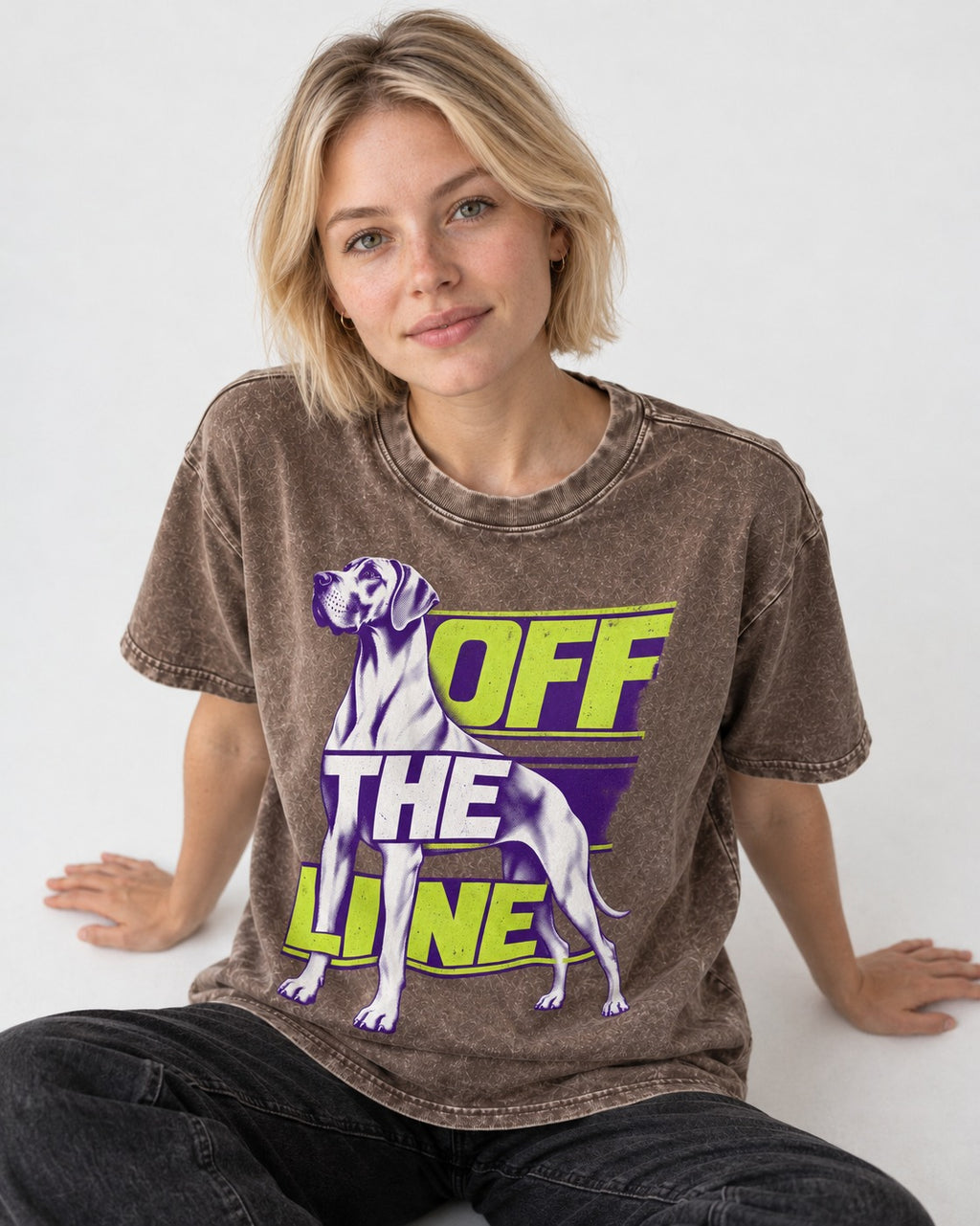 Great Dane Off the Line Washed Tee in Coffee, worn by a seated model