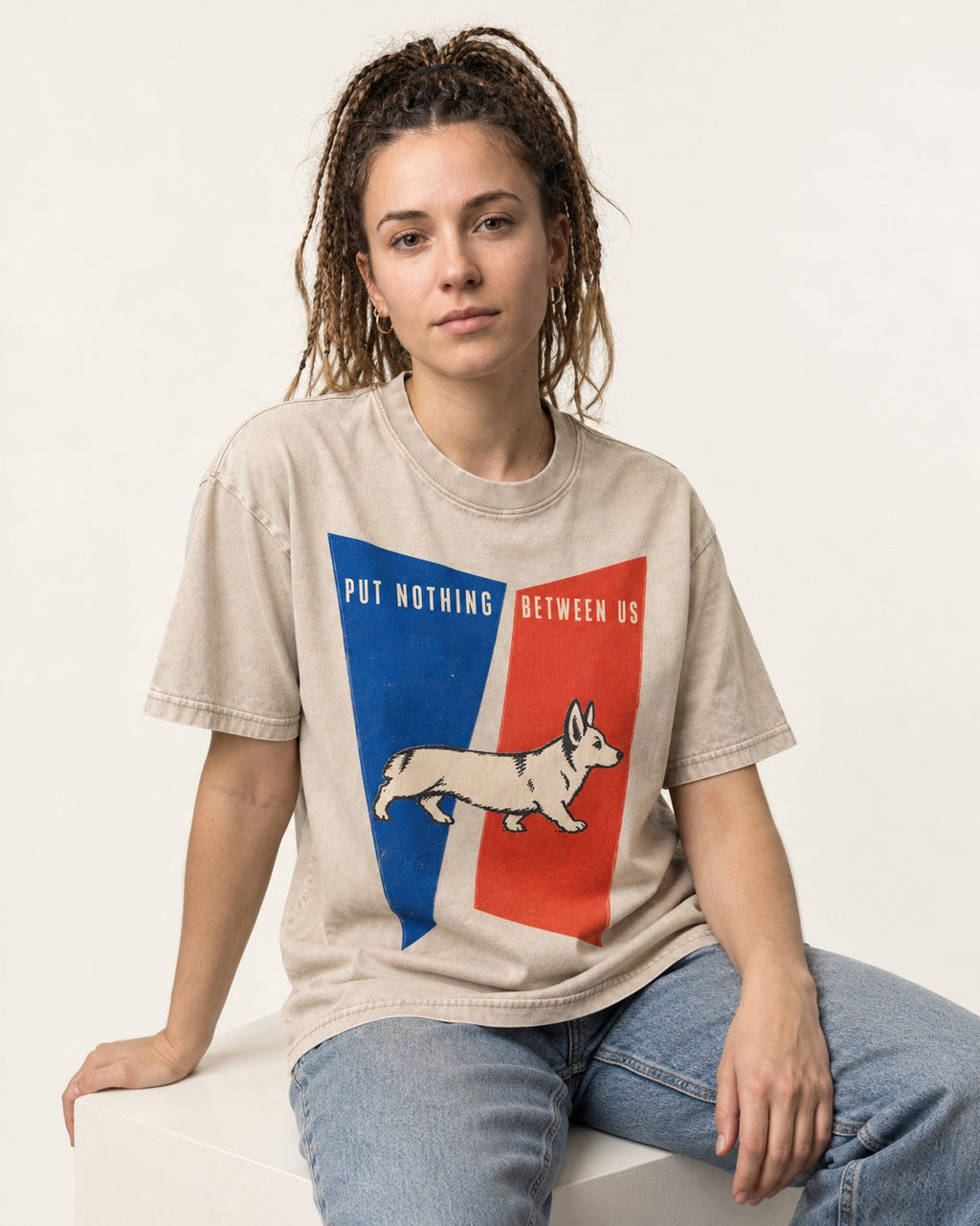 Corgi Put Nothing Between Us Split Panels Washed Tee in Apricot, worn by a seated model