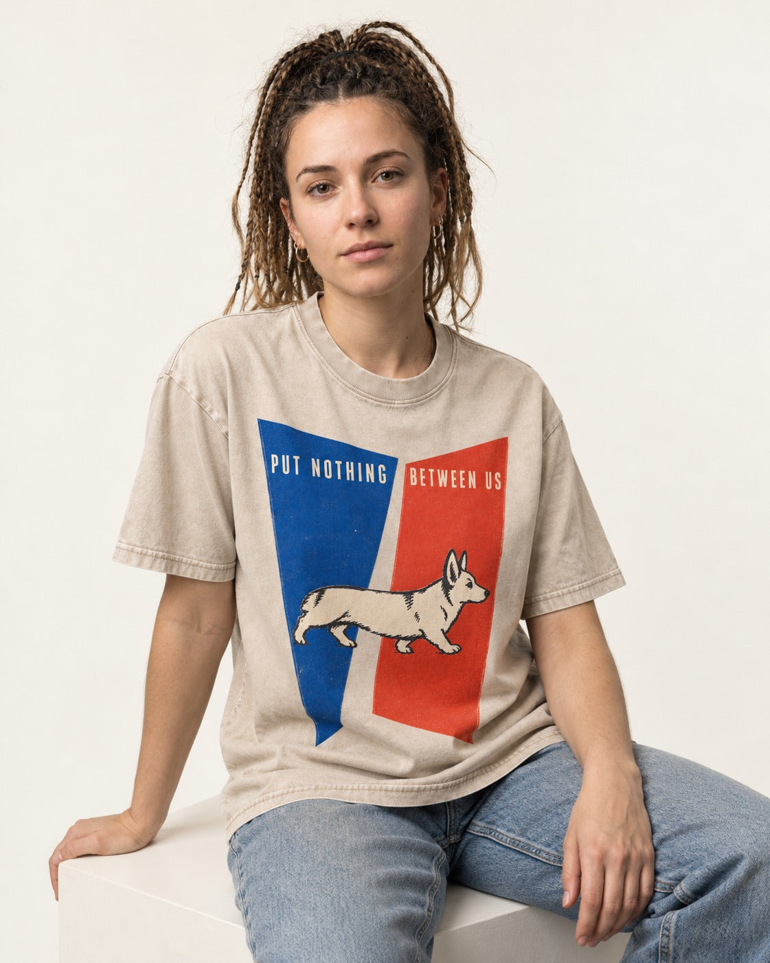 Corgi Put Nothing Between Us Split Panels Washed Tee in Apricot, worn by a seated model