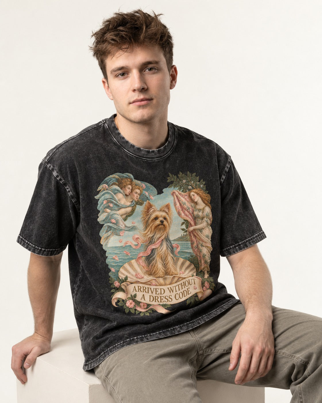Yorkshire Terrier Arrived Without a Dress Code Venus Graphic Washed Tee in Black, worn by a seated model
