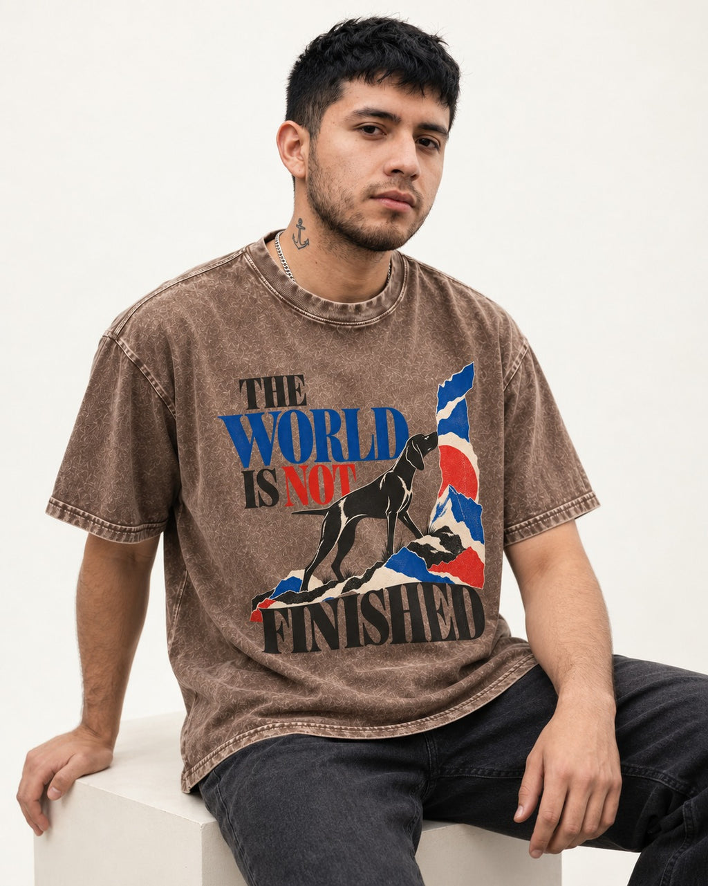 World Is Not Finished German Shorthaired Pointer Washed Tee in Coffee, worn by a seated model