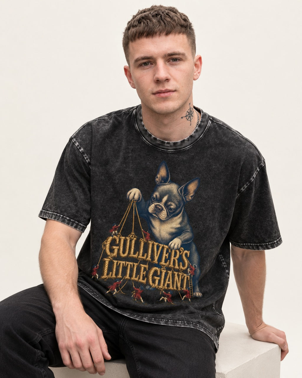 Boston Terrier Gulliver’s Little Giant Washed Tee in Black, worn by a seated model