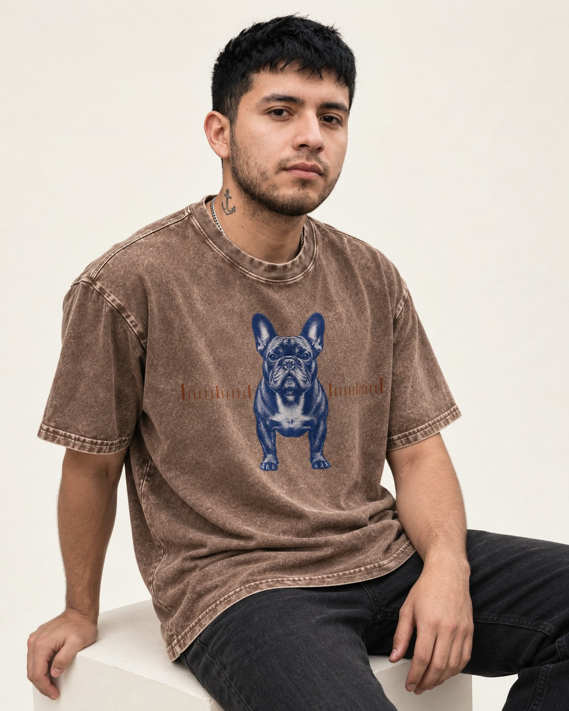 Frenchie Outside the Measure Washed Tee in Coffee, worn by a seated model