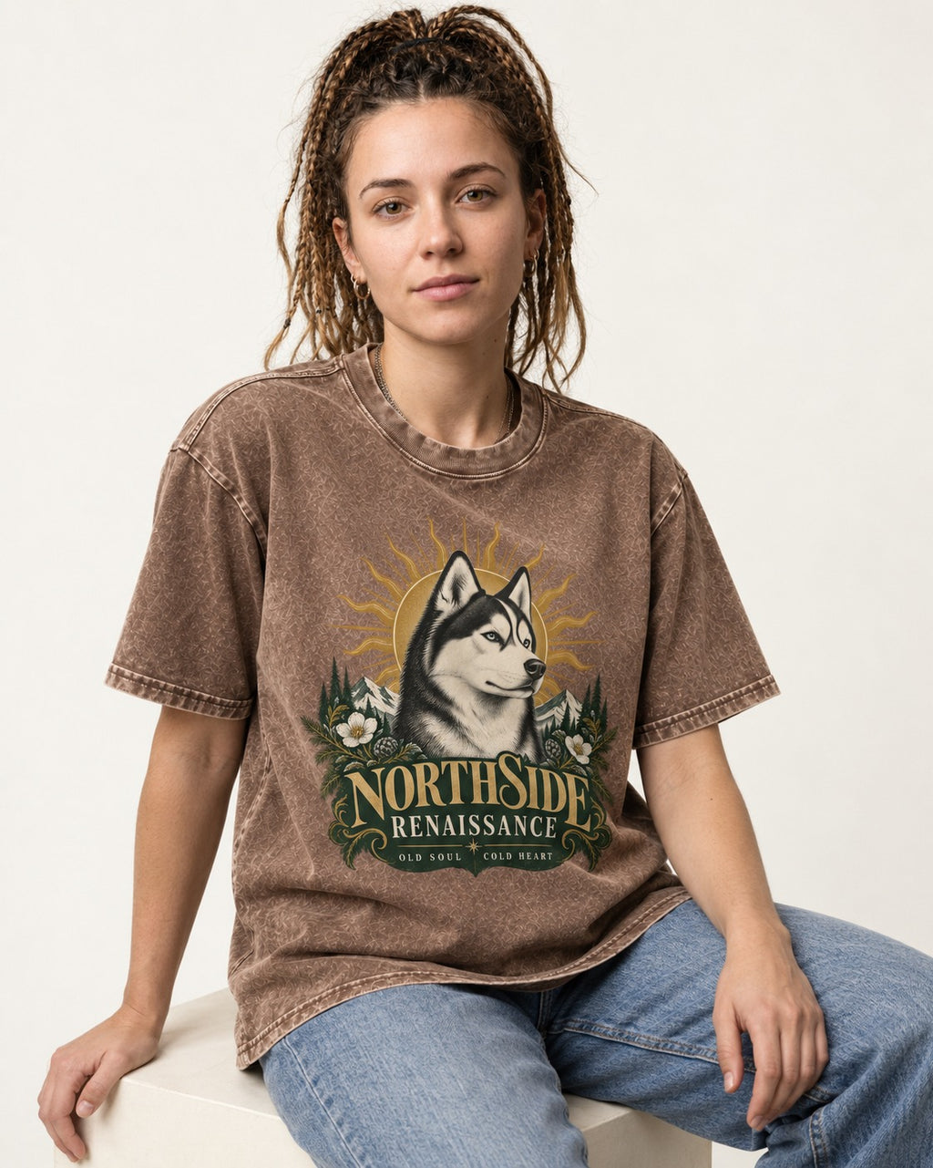 Northside Renaissance Husky Washed Tee in Coffee, worn by a seated model