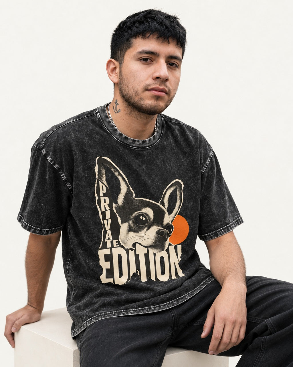 Chihuahua Private Edition Cut-Paper Portrait Washed Tee in Black, worn by a seated model