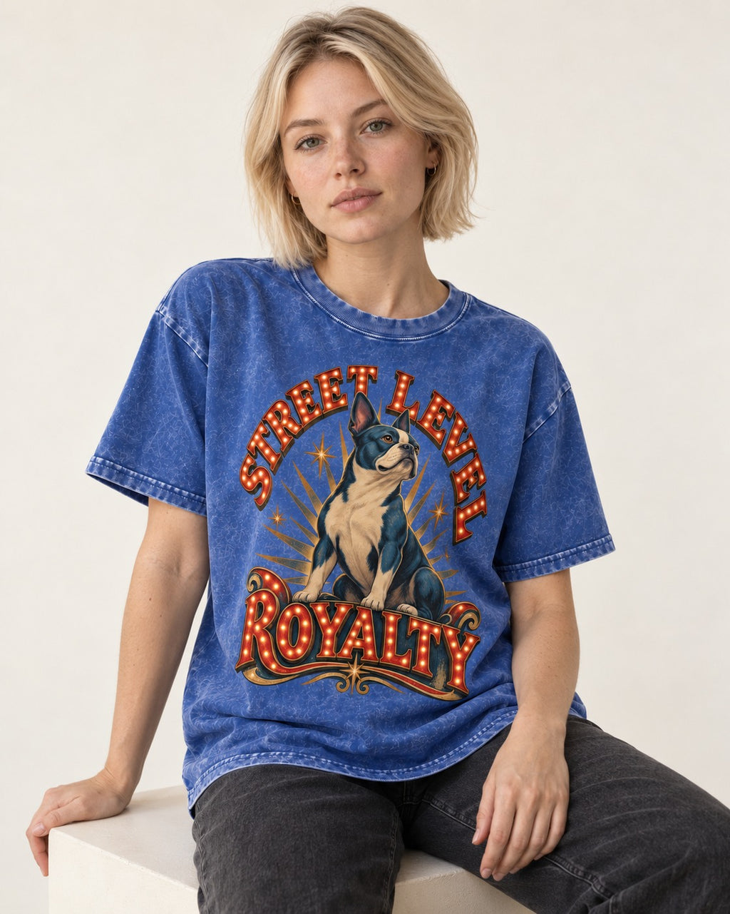 Street Level Royalty Boston Terrier Washed Tee in Royal Blue, worn by a seated model