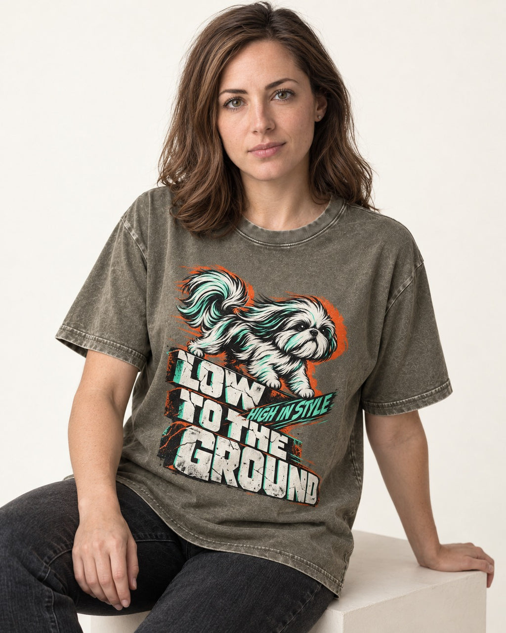 Shih Tzu Low to the Ground High in Style Streetwear Graphic Washed Tee in Army Green, worn by a seated model