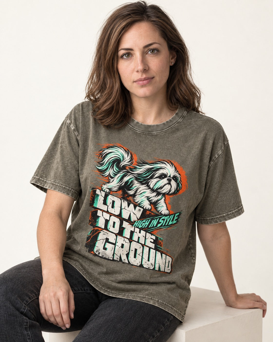 Shih Tzu Low to the Ground High in Style Streetwear Graphic Washed Tee in Army Green, worn by a seated model