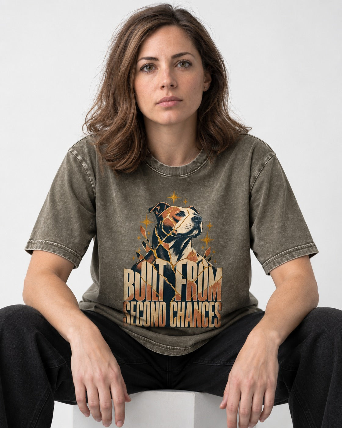 Pitbull Built from Second Chances Kintsugi Graphic Washed Tee in Army Green, worn by a seated model