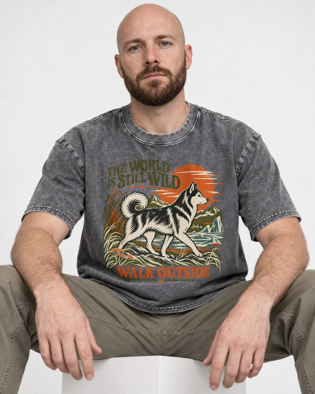Walk Outside with Husky Washed Tee in Gray, worn by a seated model