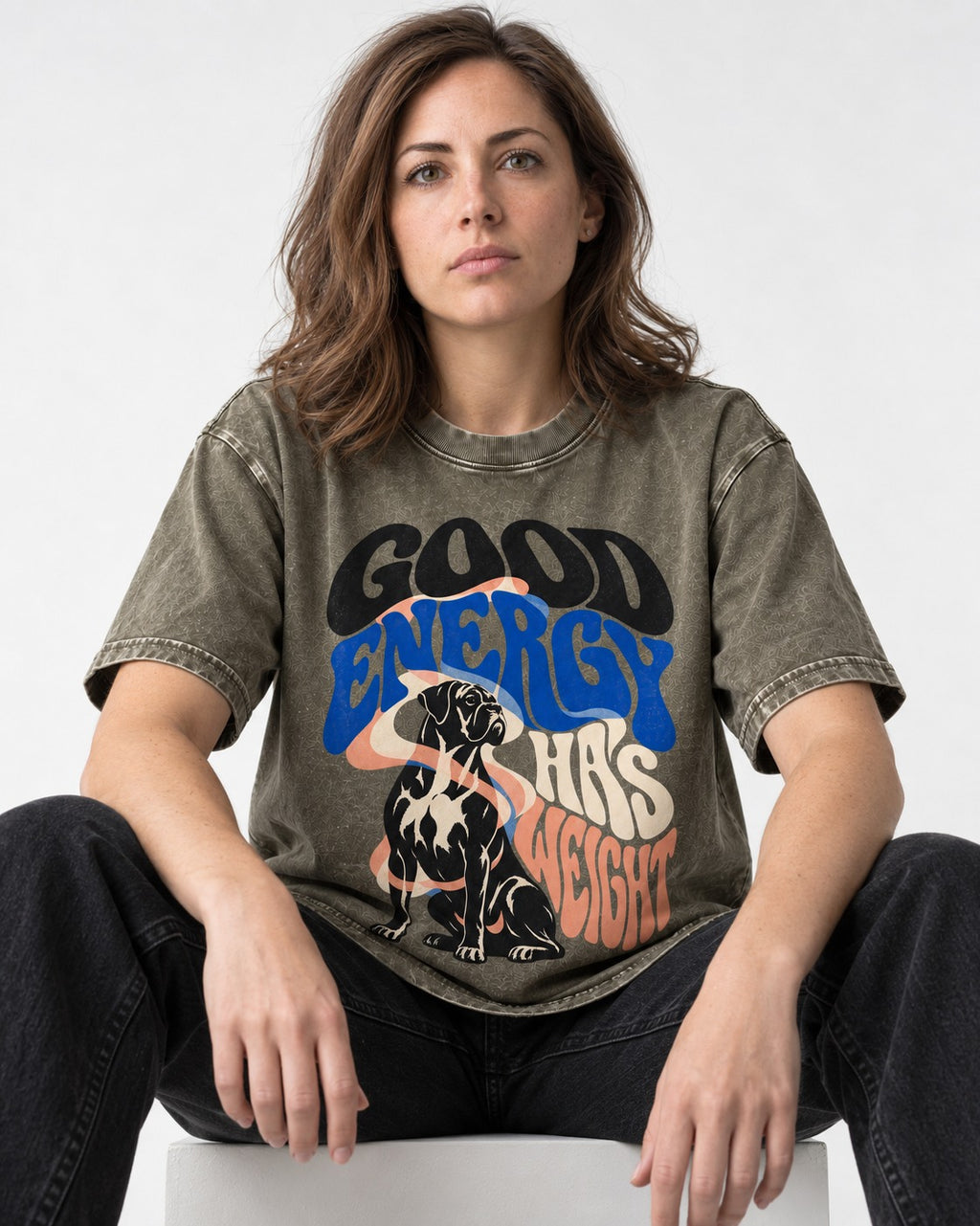 Good Energy Has Weight Boxer Retro Typography Washed Tee in Army Green, worn by a seated model