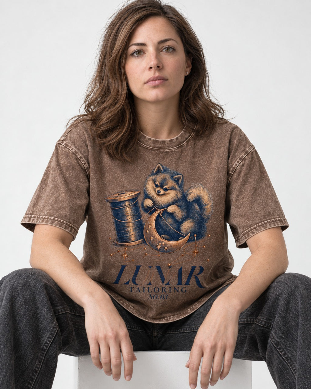 Pomeranian's Lunar Tailoring Washed Tee in Coffee, worn by a seated model
