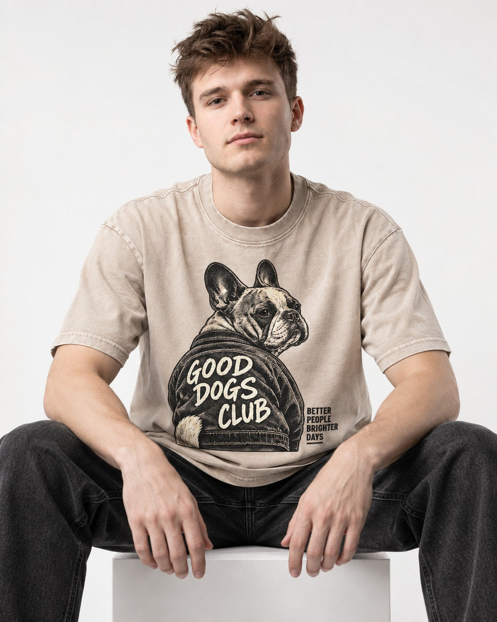 Good Frenchie Club Washed Tee in Apricot, worn by a seated model