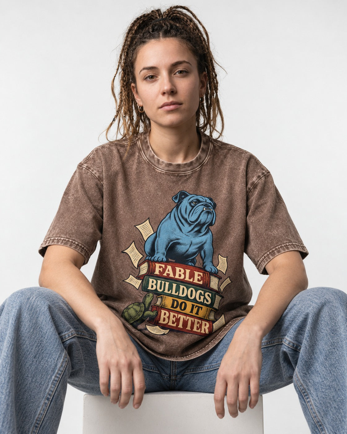 English Bulldog Does It Better Washed Tee in Coffee, worn by a seated model