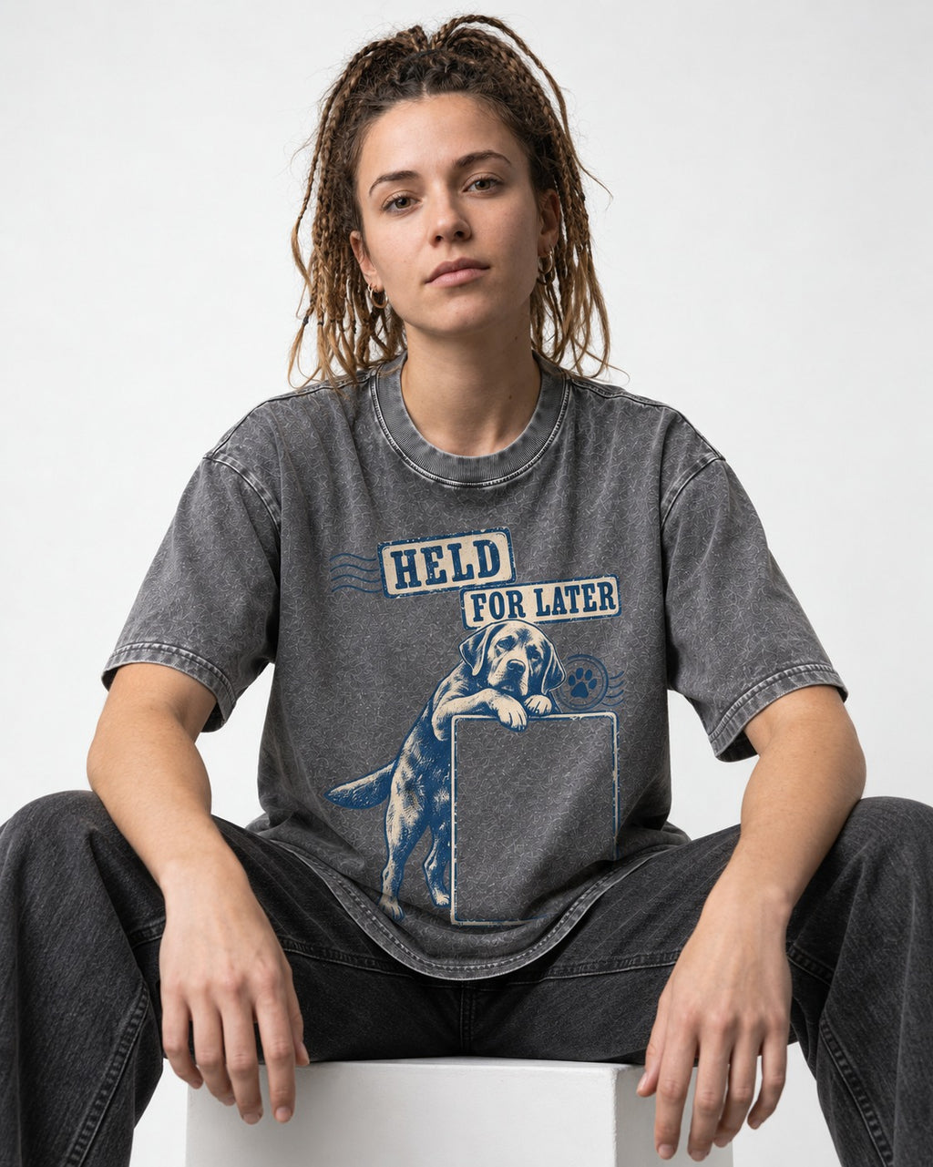 Held for Later Labrador Retriever Washed Tee in Gray, worn by a seated model