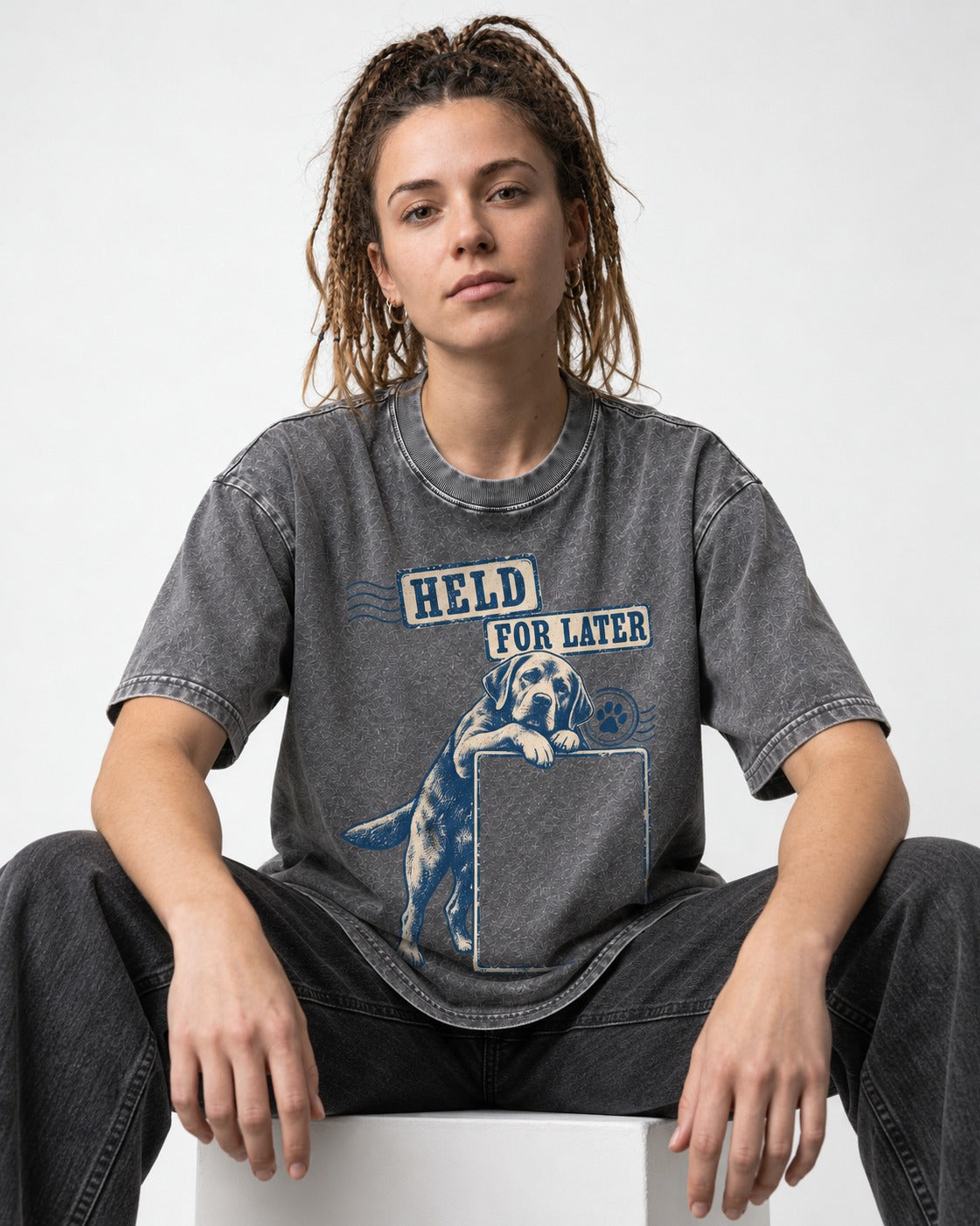 Held for Later Labrador Retriever Washed Tee in Gray, worn by a seated model